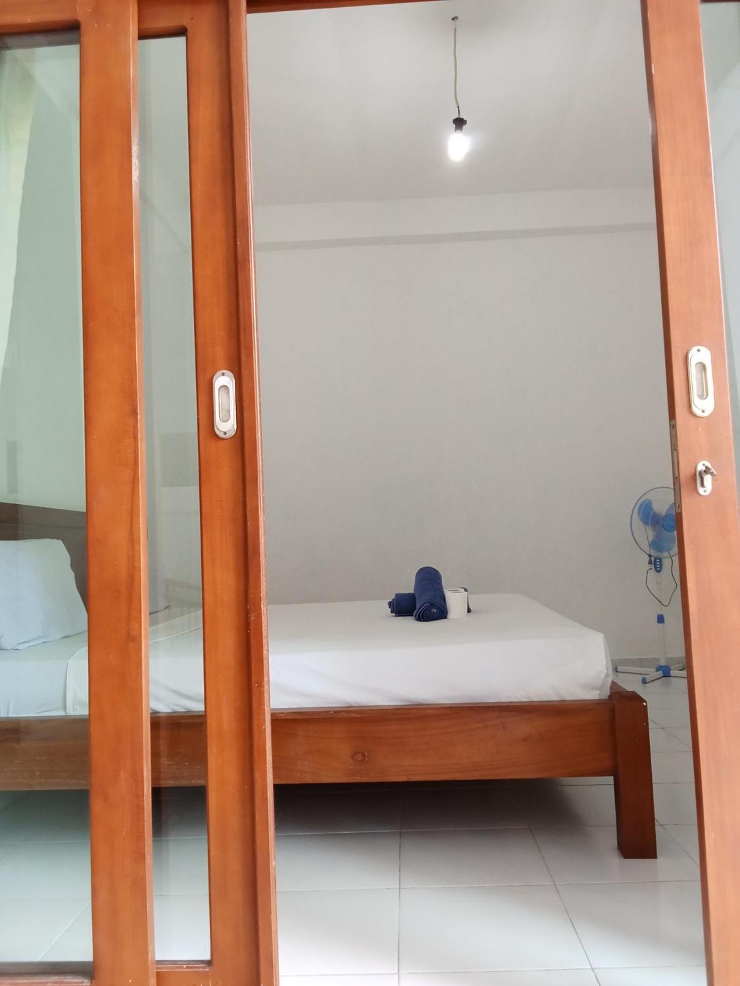 אמד Komang Homestay מראה חיצוני תמונה